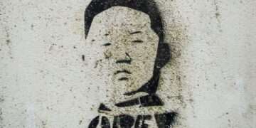 black and white human face drawing